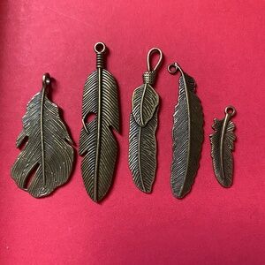 Set of 4 Beaded Accessories with Unique Charms